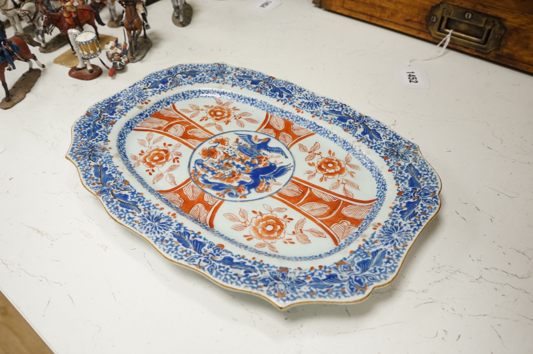 A Chinese export armorial dish, 18th century, possibly Dutch decorated, 33cm wide